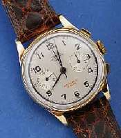 LANDERON ARMBANDCHRONOGRAPH, SCHWEIZ UM 1949 , RG 750/000, BOD. U. GLASRAND AUFGEDR., METALLCUV. ZUR ARMIERUNG, VERSILB. 2-FARB. BL. BEZ. WEMA ...