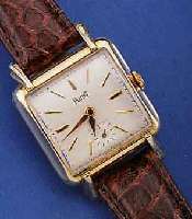 PIAGET HERRENARMBANDUHR, SCHWEIZ UM 1948 (SELTEN), METALL-CARRE-ARONDE-GEH. M. AUFGE- S. GESPREIZTEN BANDANST., KONKAVGL., EDELST.- BOD. AUFGEDR., ...