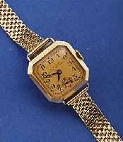 MOVADO DAMENGOLDBANDUHR, SCHWEIZ UM 1935, GG 585/000, CARREE-COUPE-GEH. INCL. ZEITGLEICHEM, NEUTR. GG-FLECHTBD., AN DER SCHL. DEHNUNGSAUS- GL., ...