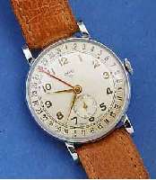 ORIS FRÜHE HERRENARMBANDUHR M. DAT. A. ZIFFER- BL. AUßENKRANZ, METALL VERCHR., EDELST.-BOD. U. GLASRAND AUFGEDR., SCHWEIZ UM 1952, D. CA. 35 MM, ...