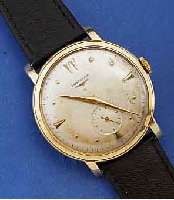 LONGINES HERRENARMBANDUHR, SCHWEIZ UM 1951, GR. METALLGEH. M. 80 MICRON GG-AUFLAGE, D. CA. 39 MM, ORIG. BL. FLECKIG, KRONE ERSETZT, LE- DERBD. NEU, ...