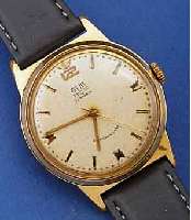 GLASHÜTTE HERRENARMBANDUHR, KAL. 70,1, HANDAUFZUG, 17 ST., METALL VERG., EDELST.-BOD. AUFGEDR., BL. FARBL. GETÖNT, STOßGES., DEUTSCHLAND UM ...