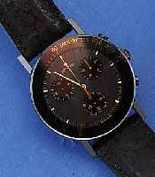 MOVADO ARMBANDCHRONOGRAPH, MUSEUMSWATCH, EDELST., SCHWARZ, HART BESCHICHTET, BOD. 4- FACH VERSCHR., SAPHIRFLACHGL. M. TACHYMETER- INNENSKALA, ...