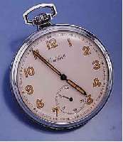 CORTEBERT HERRENTASCHENUHR OFFEN, SCHWEIZ UM 1940, NICKEL/CHROM-GEH., ORIG.-ZUST., VERS. BLATT, LEUCHTSTD.-ZEICHEN U. ZEIGER ALTERSBED. L. BRÜCHIG, ...