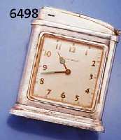 PHINNEY-WALKER GROßES BENZINFEUERZEUG MIT INTEGRIERTER UHR, ENGLAND UM 1946, METALL VERS., ALTERSBED. BER., 1-TAGE-WERK M. STIFT- ENANKERG., ...