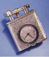 BENZINFEUERZEUG MIT INTEGRIERTER UHR, SCHWEIZ UM 1938, METALL VERN., FKT. UNGEPR., SCHWEIZER ANKERW., NICHT GEHFÄHIG, INTAKT, ÜBERH. UNERL., ...