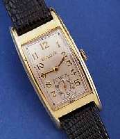 BULOVA HERRENARMBANDUHR, USA UM 1939, GG- FILLED, TONNENFORM GEZOGEN, IN SICH GEW., BODEN GEDR., MAßE CA. 23 X 21 MM, VERS. BLATT, FORMANKERW., ...