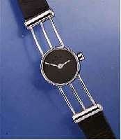MILUS DESIGNER DAMENARMBANDUHR NACH PAUL JUNOD SCHWEIZ UM 1995, METALL HARTVERCHR., LEDER- B. M. STIFTSCHL., SAPHIRFLACHGL., HIGH-TECH- QUARTZW., ...