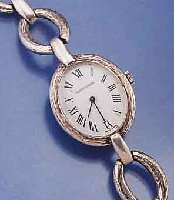 JAEGER LE COULTRE DAMENSCHMUCKUHR, SCHWEIZ UM 1970, 925ER SILBER INCL. GLIEDERB., BODEN GEDR., EMAILFARB. KONTRASTZIFFERBL., FORM- ANKERW., KAL. ...