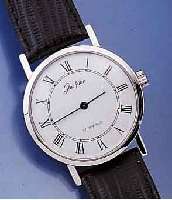 GLASHÜTTE HERRENARMBANDUHR, DEUTSCHLAND UM 1984, METALL HARTVERCHR., EDELST.-BODEN GEDR., EMAILFARB. KONTRASTZIFFERBL., LEDERB., DAMEN- ...