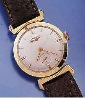LONGINES HERRENARMBANDUHR, SCHWEIZ/USA UM 1953, GG 585/000, BET. BANDANST., GLASR. GE- DR., VERS. BLATT M. AUFGEL. GOLD-STD.-ZEICHEN, GOLDZEIGER, ...