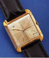 DOXA HERRENARMBANDUHR MODELL GRAFIC, GG 585/000 GEH., CARREE-ARONDE-FORM, BOD. GEDR., AUSGEFALLENES DATUMFENSTER ZW. 10 U. 11, SUISSE-EBAUCHE ...