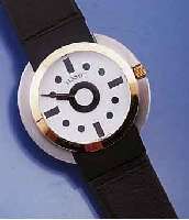 TISSOT DESIGNERHERRENARMBANDUHR SOTTSASS, SCHWEIZ UNGETR. LAGERW. UM 1988, EDELST. MATT. GOLDLÜNETTE, BOMB. SAPHIRGL., KONTRASTZIFFER- BL., ...