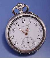 LONGINES HERRENTASCHENUHR OFFEN, SCHWEIZ FÜR DEN DTSCH. MARKT UM 1912, 800ER SILBER, BER./ DELLIG, EMAILBL. SIGN., VERG. PLATINENW. M. ...