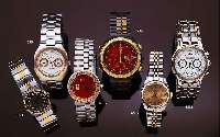 FERRARI ARMBANDCHRONOGRAPH, QUARTZ, SCHWEIZ UM 1994, ASYM. DESIGNERGEH. SCHW. MATT., WIE BAND, ZWISCHENGL., DRÜCKER U. LÜN. HARTVERG., FALTSCHL. ...