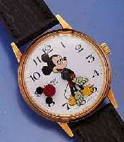 MICKEY MOUSE ARMBANDUHR, FRANKREICH UM 1970, MYSTERIEUSE SEK.-ANZ. DURCH TRANSPARENTE ZEI- GERSCHEIBEN, METALL VERG., STIFTENANKERW. VON CATTIN, ...
