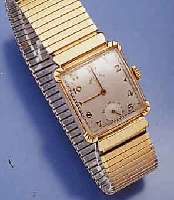 LORD ELGIN HERRENARMBANDUHR, GG-FILLED, USA UM 1949, BOD. AUFGEDR., ZUGGLIEDERBD. SEKUNDÄR , BOD. M. WIDMUNGSGRAV., VERSILB. BL., FORM- ANKERWERK, ...