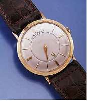 LONGINES HERRENARMBANDUHR, SCHWEIZ/USA UM 1960, GG-FILLED, GLASR. GEDR., MYSTERIEUSE ZEITANZ., STD. HIER DURCH ZEIGERSCHEIBE, BLATT REST., ...