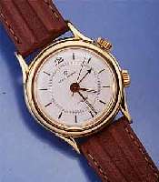 REVUE THOMMEN ARMBANDWECKER CRICKET, SCHWEIZ UM 1995, METALL HARTVERG., EDELST.-DOPPELBOD., VERSILB. BL., BASISKAL. AS, HANDAUFZ., GEH- U. WECKW. ...
