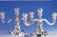 3-ARMIGES KERZENLEUCHTERPAAR, GEBR. KÜHN, SCHWÄBISCH GMÜND, 925ER SILBER, BAROCKSTIL, BODENPLATTE METALL VERSILBERT, ZUR ARMIERUNG, TOTAL CA. ...
