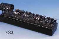 BRIEFBESCHWERER/OBJEKT? OCHSENGESPANN VOR PLANWAGEN, 8SPÄNNIG, SILBER, VIETNAM UM 1900/1940, AUF SCHWARZ LACKIERTEM HOLZSOCKEL BEFESTIGT, TOTAL ...
