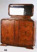 SIDEBOARD, FRANKREICH, ART-DECO, UM 1930, NUSSBAUMFURNIER, ZEITTYPISCH GESCHNITZT, GE- ÄDERTE MARMORPLATTE, 2-TÜRIG (TÜREN L. VER- ZOGEN), 1 ...