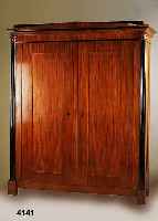 Großer Biedermeierschrank, deutsch, um 1830, Mahagonifurnier, kassettiert, schwarze Voll- sÄulen, poliert, sehr elegant, min. Alters- schÄden, ...