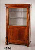 Vitrine, deutsch, um 1870, Kirsche massiv, eintÜrig, 3/4-verglast, seitlich SÄulendekor, aufgesetzte Schnitzereien, ca. 162x101x50 cm , ohne ...