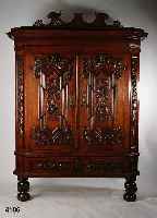 Spaltschrank, sÜddeutsch, Korpus 2/3 um 1750, in der 2. HÄlfte des 19. Jahrhunderts ver- ziert mit Schnitzereien im norddeutschen Stil, Eiche ...