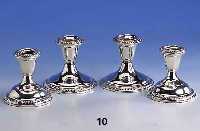 Konvolut 4 Kerzenleuchter, Amerika, 925er Silber, gefÜllt, Kordelbandverz., je 1 Brennstelle, H. ca. 9 cm