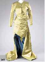 Abendminikleid m. Schleppe und Bolero, Gr. 38, PETER KEPPLER, goldfarb. Taftseide mit tÜrkisfarb. Innenfutter, trÄgerlos, einge- arbeitete ...