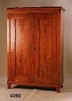 Schrank, deutsch, um 1850/60, Esche massiv, vertiefte geschwungene FÜllungen, zerlegbar, zweitÜrig, minimale ErÄnzungen, Fuß hi. li. lose, ...