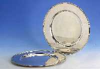 Set: 2 Platzteller, 925er Silber, Gew. total ca. 975 g, D. ca. 32.6 cm, glatte Form, Gebr.-sp.