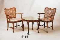 Tisch und 2 StÜhle, Italien, 60er Jahre, Barock- bzw. Chippendalestil, Nußbaum massiv, Nußbaumfurnier, StÜhle mit Rohrgeflech, min. ...
