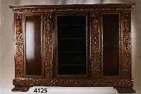 BÜcherschrank, deutsch, um 1928/35, Renais- sancestil, massiv gearbeitet, Buche, Weich- holz und Eiche, Bildhauerarbeit, Zarge, Kopf- kranz und ...