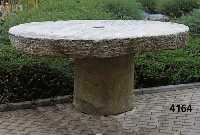 Steintisch, MÜhlstein aus Granit, mit Fuß, etwa 150 Jahre alt, Rillen fÜr Mahlgut sichtba r, Abnutzungsspuren, selten im Angebot, H. ca. 75 cm, ...