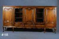 VielzweckmÖbel, deutsch, 60er/70er Jahre, Barockstil, Nußbaum massiv, Nußbaumfurnier, gespiegelt, gelblich getÖntes Glas, aufgesetz- te ...