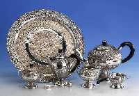 5-teil. Teeservice auf Tablett, Malaysia, 925er Silber, um 1930/40, Kannengriffe und DeckelbekrÖnung Holz, best. aus: Teekanne, H ca. 16 cm, ...