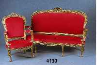 SalonmÖbel, bestehend aus Stuhlsessel und 3-sitzer Sofa, Rahmen wohl Buche, reich ge- schnitzt, in florentinischem Barockstil, teil- vergoldet, ...