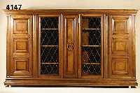 BÜcher- bzw. Vielzweckschrank, deutsch, Korpus Weicholz, Buche, Rahmen Nußbaum massiv, 6- bis 8-fach gewellt, Leistenverzierung, Kasetten mit ...