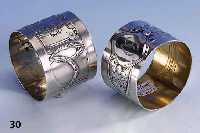 Konvolut 2 Serviettenringe, deutsch um 1900/ 10, 1 x Grimminger Pforzheim, Durchm. ca. 4.6 mm, Bes.-Monogr., 800er Silber; 1 x WMF, Metall ...