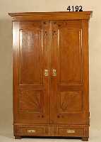 Schrank, deutsch, um 1910/20, Ulmefurnier, zweitÜrig, dekoriert mit gekerbter und colo- rierter Zierornamentik im Sinne des Jugend- stils, ...