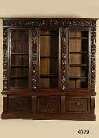BÜcherschrank, Niederlande, um 1900, Renaissancestil, Eiche massiv, Lisenen und Kopf reich geschnitzt, aufgesetzte BlÜten, FrÜchte und ...