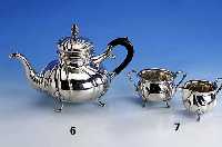 Teekanne, Kopenhagen 1926, 830er Silber, Barockstil, teilweise Treibarbeit, 4 FÜße, Wardeinmarke Heise, Griff Holz geschwÄrzt, Deckel mit ...