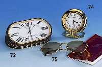 CARTIER-Reisewecker, Metall vergoldet, Quartzwerk, Batt. muß ers. werden, Serie Must de Cartier, orig. Etui und Papiere