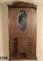 Wandgarderobe, deutsch, um 1910, Eiche fur- niert, Ablabe und Handschuhfach, facettiert gespiegelt, Altersspuren, ca. 206x105x29 cm