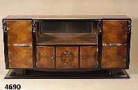 ArtDeco-Sideboard, Frankreich, um 1920, z.T. Nußbaum massiv, z.T. Wurzel-Nußbaum ge- spiegelt furniert, z.T. ebonisiert, SÄulen- sockel und ...