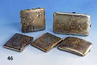 Konvolut 5 Zigarettenetuis, 800er Silber, versch. Ägyptisierende Motive, z.T. gelb- bzw. rotvergoldet, total ca. 430 g