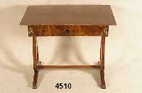 Schreibtisch, deutsch, um 1830/40, Korpus Weichholz, Nußbaumwurzelfurnier gespiegelt, Wangen in Lyrenform, durch Stab miteinander verbunden, ...