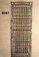 Weinregal, deutsch, um 1900/10, Eisen, ver- nietet, aufwendige Handarbeit, TÜr fÜr HÄnge- schloß gebaut, grau gestrichen, leicht korro- diert, ...